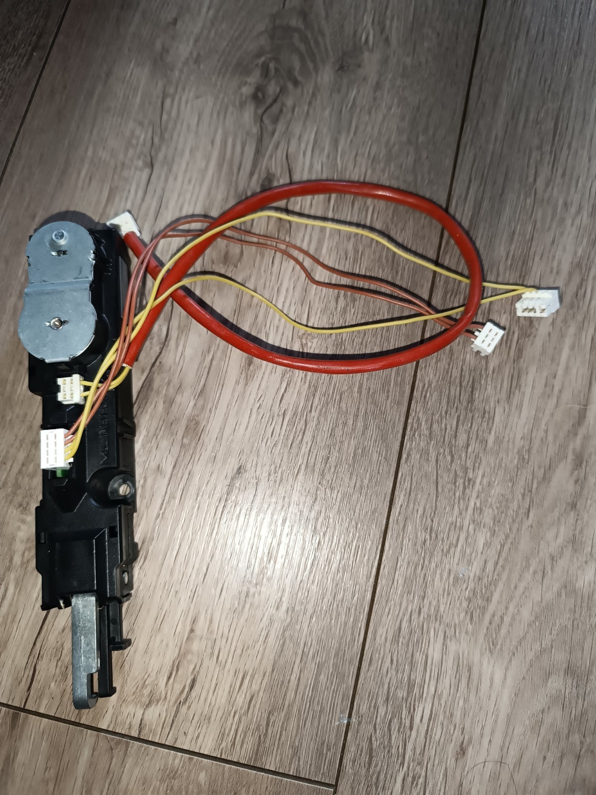 s-l1600-1002.jpg Automotive switch assembly with multiple colored wires and white connectors on a wood floor surface.
