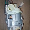 Galanz capacitor‑run motor with white plastic impeller housing and exposed copper windings on a metal frame.