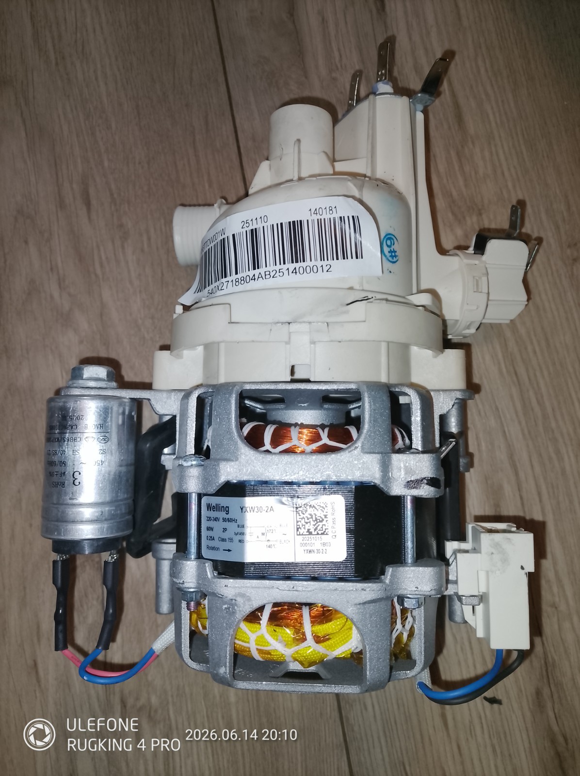 s-l1600-1155.jpg Electrical pump and motor assembly with white plastic housing, barcode label, and visible copper windings in the metal frame.
