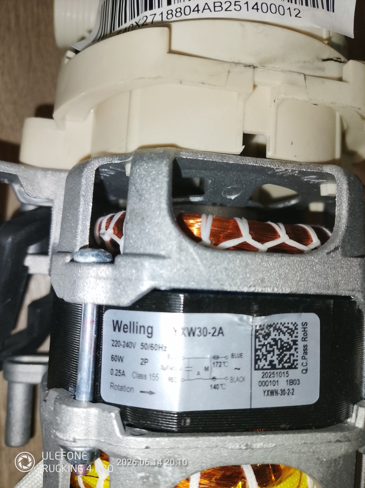 s-l1600-1156.jpg Close-up of a Welling YKW30-2A electric motor showing copper windings and internal wiring inside the housing.
