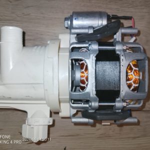 Electric pump assembly with white plastic housing and exposed copper-coil motor, used to circulate water in an appliance.