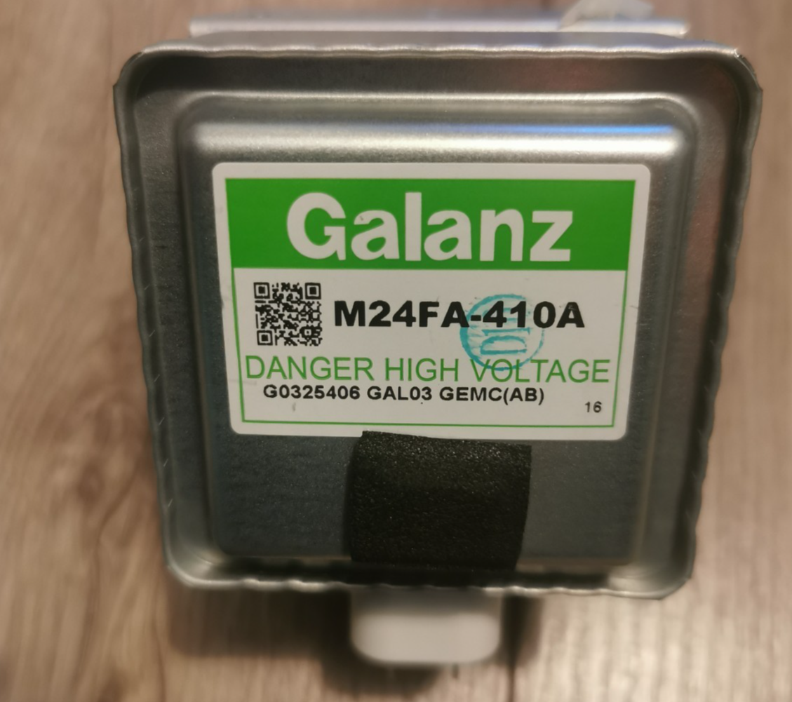 s-l1600-23.png Galanz M24FA-410A transformer with a green DANGER HIGH VOLTAGE label.