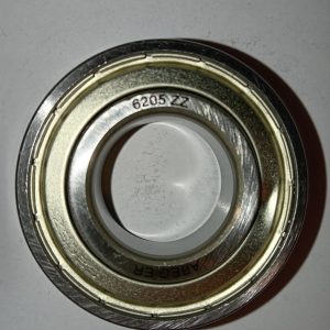 Close-up of a metal ball bearing with inner and outer rings, stamped with '6205ZZ'.