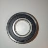 Radial ball bearing with inner and outer rings, stamped with 6207RS on the outer race.