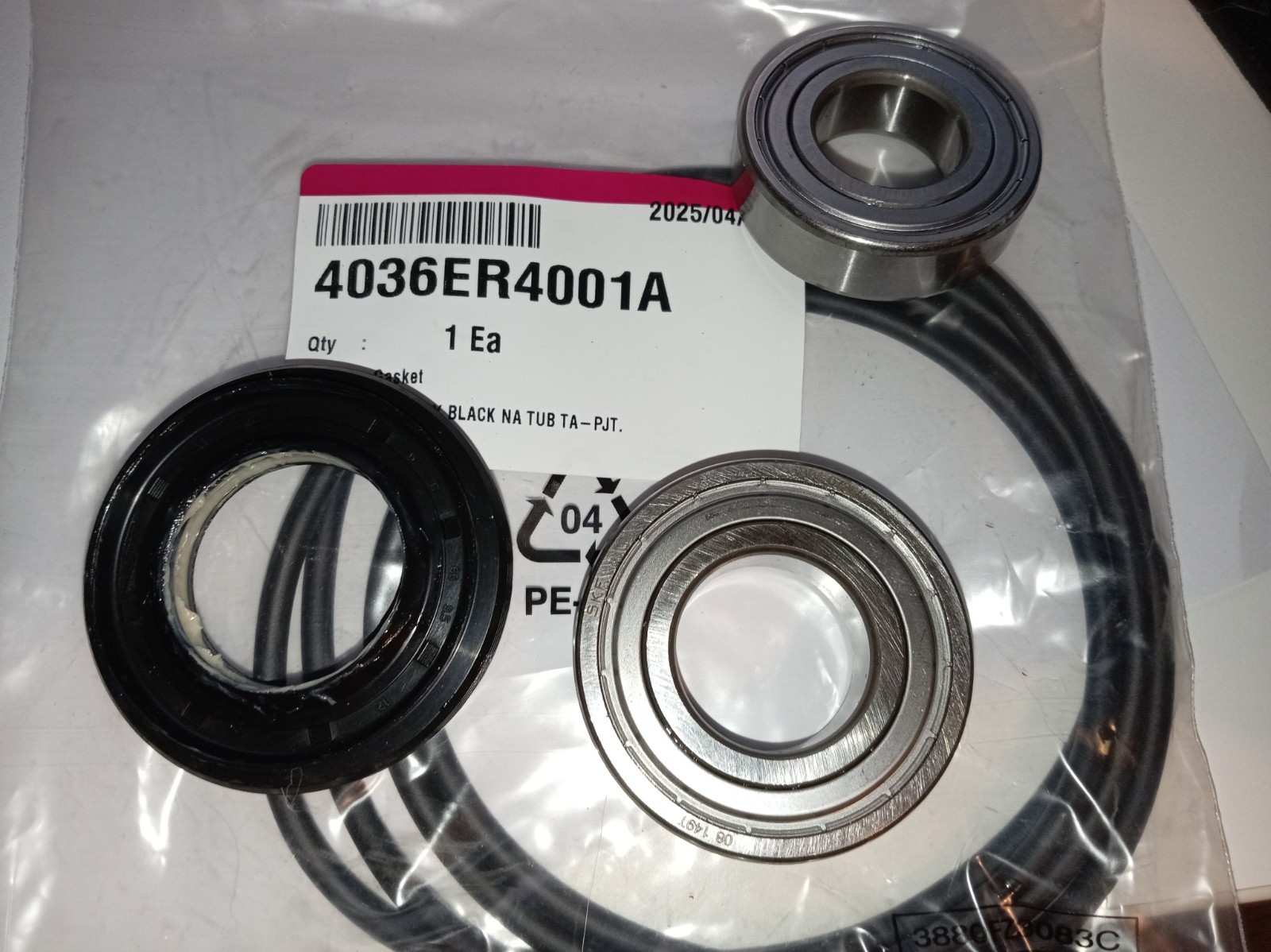s-l1600-321.jpg Bearing kit with metal inner/outer rings and black rubber seal on clear bag, label reads 4036ER4001A.