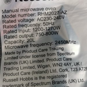 Label on a Russell Hobbs manual microwave: Model RHM2027-AZ, 20L capacity, 230–240V, 50Hz, 1200–1270W input, 750–800W output, 2450MHz.