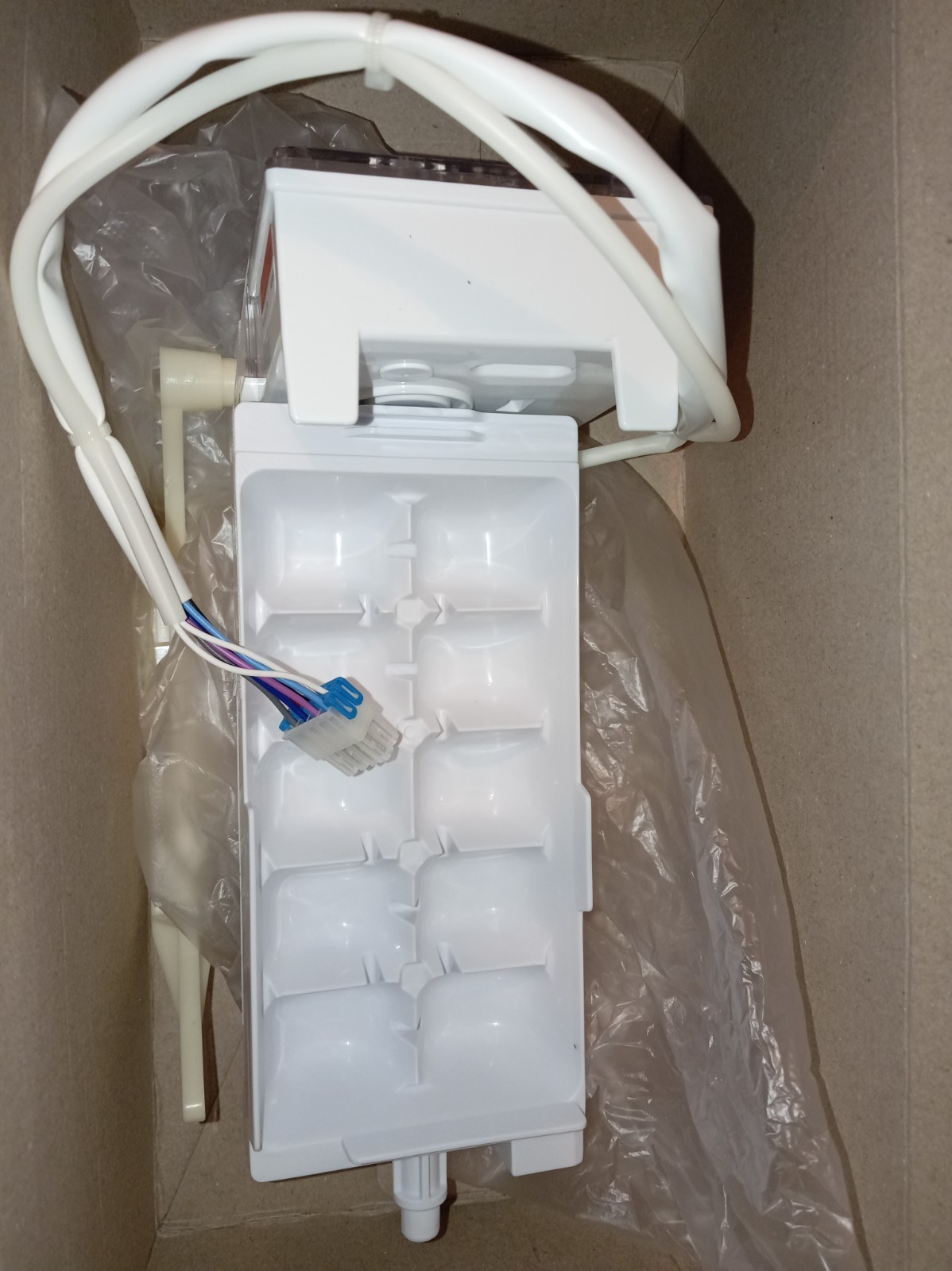 s-l1600-378.jpg White plastic electrical control module with a wire harness and blue connector, packed in a cardboard box.