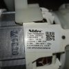 Close-up of a Nidec motor label on an appliance, showing type PA085A250C01, 2650 rpm, 86 W, 220-240V, 50 Hz, IP00.