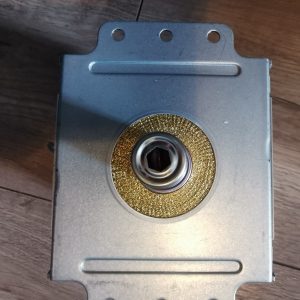 Metal electrical box with a gold textured circular hub around a hex drive opening and three top mounting holes in the metal plate.