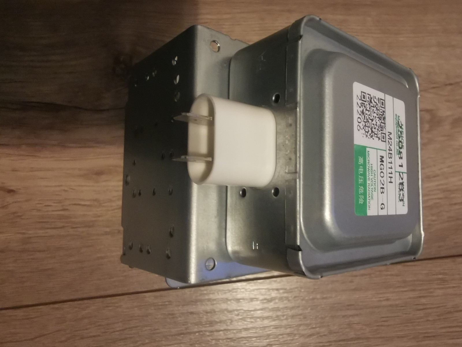 s-l1600-661.jpg Electrical transformer module with a white ceramic terminal and metal enclosure on a wooden surface