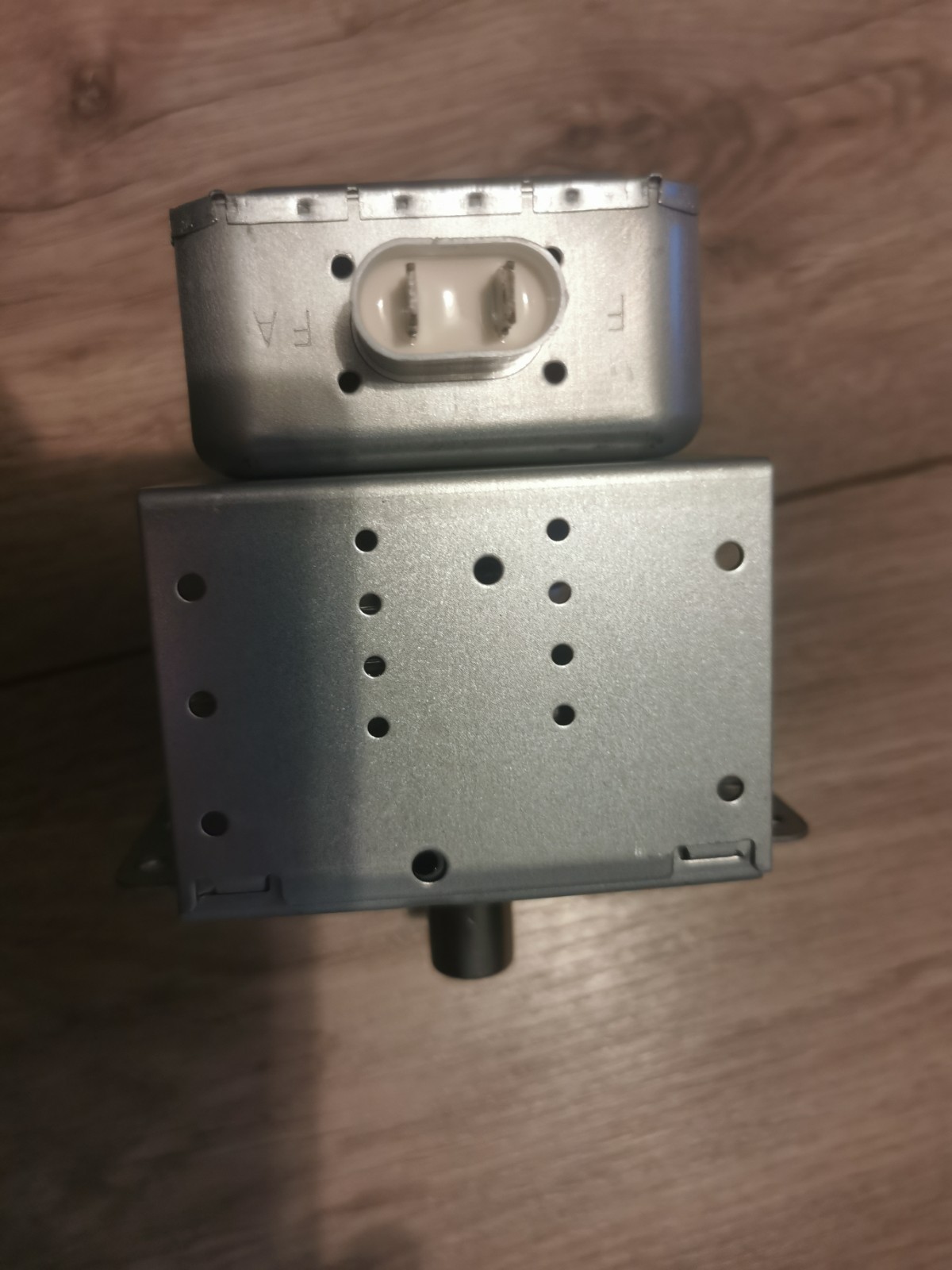 s-l1600-665.jpg Two-pin white automotive connector on a metal electronic control module with a perforated enclosure (likely a blower or actuator unit).