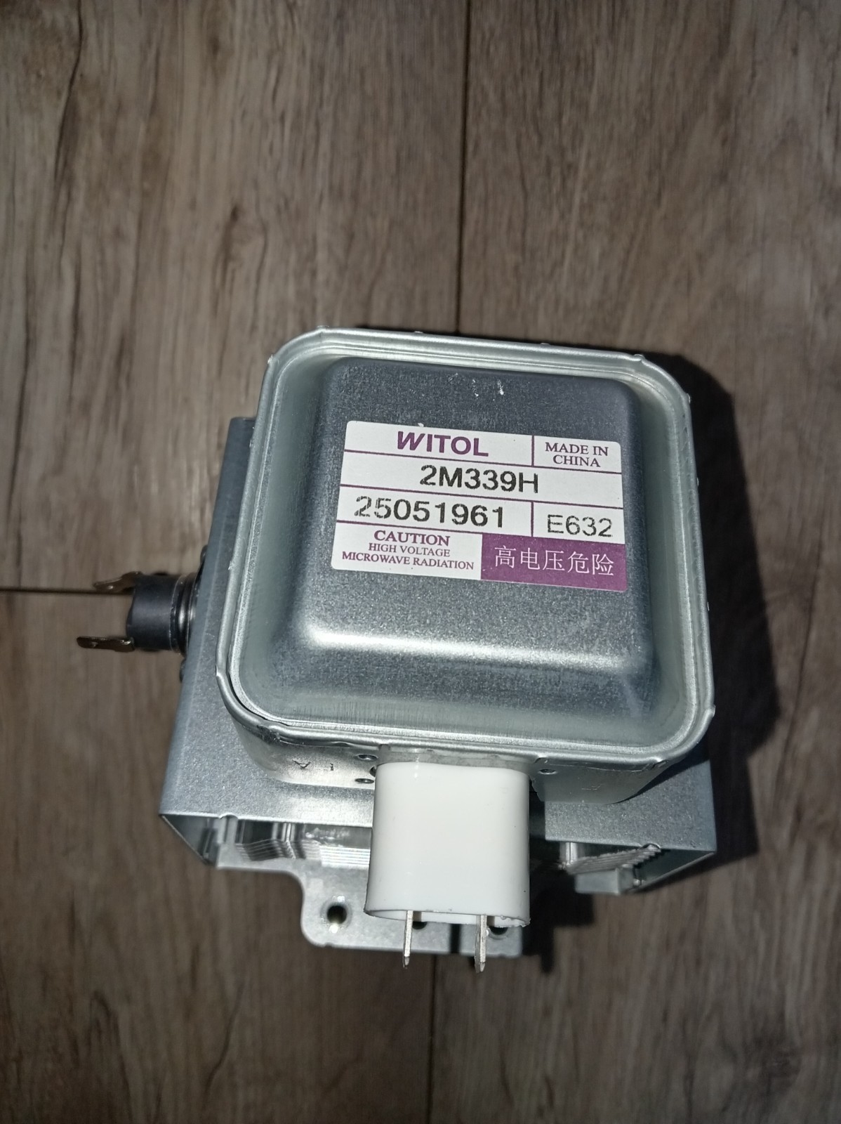 s-l1600-691.jpg Industrial transformer unit with a WITOL label and caution reading 'HIGH VOLTAGE MICROWAVE RADIATION' on a metal housing.