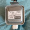Metal high-voltage transformer with WITOL label and caution note about microwave radiation, made in China (model 2M219J)