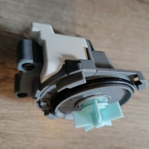 Close-up of a gray LEGO Technic assembly with a teal connector piece and exposed axle hole