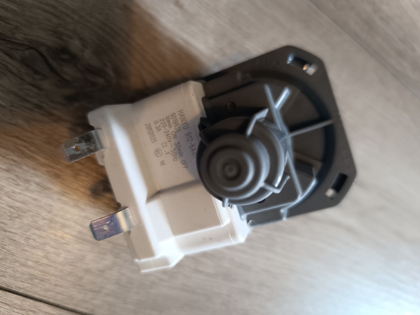 s-l1600-908.jpg White electrical switch/valve with a round black dial and two metal mounting prongs; appears to be a dimmer or control component.