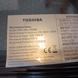 Toshiba microwave oven label showing model MW3-EM23PF(MB) with input 1300–1400 W, output 900 W, and 2450 MHz frequency.